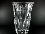 a close up of a glass vase on a table