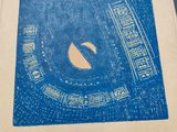 a picture of a blue and white picture on a piece of paper
