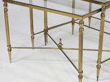 pair of brass side tables with glass tops and legs