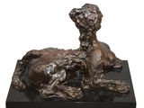 bronze statue of a dog and a cat on a black base