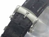 a close up of a wrist watch with a black strap