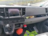 a car dashboard with a bunch of items in it
