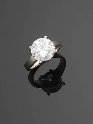 a diamond single - stone ring, by van cleef