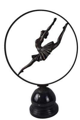 a statue of a ballerina in a circle with a ballerina on it
