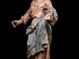 a statue of a woman holding a child in her arms
