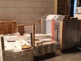 a room with a lot of boxes on the floor