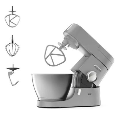 a silver mixer with a metal bowl and a whisk attachment