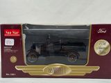 an old model car is in a box on a white surface