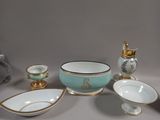 a table with a bowl, bowl, and other items on it