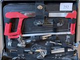 a tool case with tools in it sitting on a table