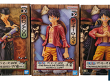 three action figures of one piece and one piece of the same character