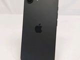 an apple iphone sitting on top of a stand on a white surface