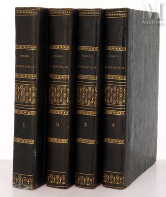 three books sitting on top of each other on a table