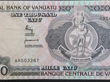 un gros plan d'un billet de banque sur lequel figure le portrait d'un homme