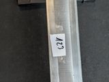 a metal pole that has a number on it