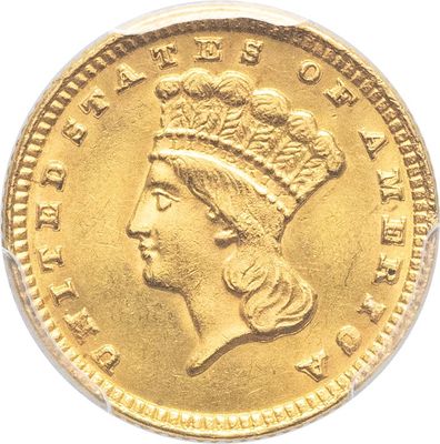 Gros plan sur une pièce d'or ornée d'une tête de femme