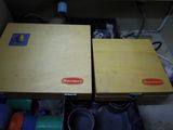 two boxes that are sitting next to each other
