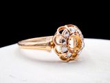 une image représentant une bague en or sertie d'un diamant taille rose
