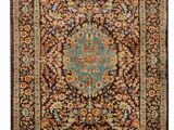 an antique persian rug with a medallion design and fringe fringes