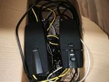 a box with a bunch of wires in it on the floor