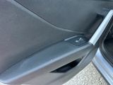 a close up of a door handle in a car