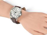 someone is wearing a watch on their wrist on a mannequin hand