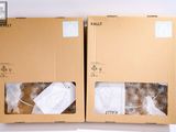 emballage composé de deux boîtes contenant chacune une paire de chaussettes