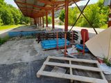many pieces of wood that are sitting on the ground