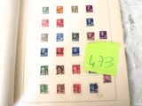 une feuille de papier sur laquelle figurent des images de timbres