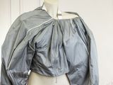 a mannequin wearing a jacket on a mannequin mannequin