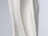 a close up view of a sculpture of a woman ' s legs