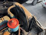 a car engine with a red cap on it