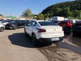 a lot of cars that are parked in a lot