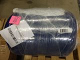 a roll of blue yarn wrapped in plastic on a pallet