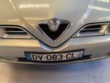 a close up of a car that is parked in a garage