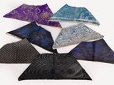 six pieces of blue, purple, and black handkerchiefs on a white surface