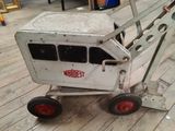a toy truck that is sitting on a wooden floor