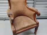 a chair that is sitting in front of a garage door