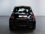 a black car that is parked in a room