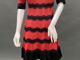 a red and black dress on a mannequin mannequin mannequin mannequin mannequin mannequin mannequin mannequin mann