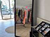 a large mirror in the middle of a room