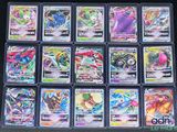 a close up of a bunch of different pokemon cards in a box
