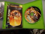xbox game disc in a green case with a picture of a tennis player on it