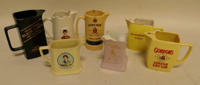 many different types of coffee mugs sitting on a table