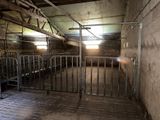 a room with a lot of stalls inside of it