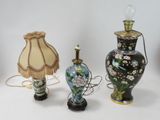 several different types of vases and lamps on a white surface