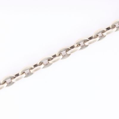 a close up of a silver chain on a white background