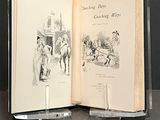 un livre ouvert sur lequel figure l'image d'un cheval et d'un cavalier