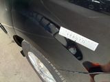 a sticker on the door of a car that says vauto