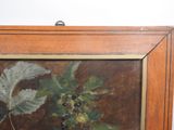 a picture of a painting of a plant in a wooden frame